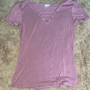 Plum colored v-neck top.